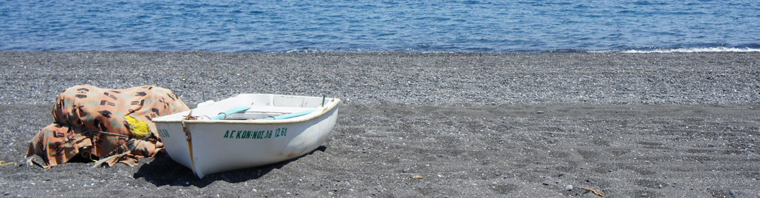 Santorini cruise. Black Sand beach.